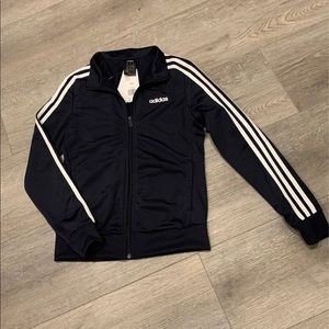 Woman’s Adidas Track Jacket.